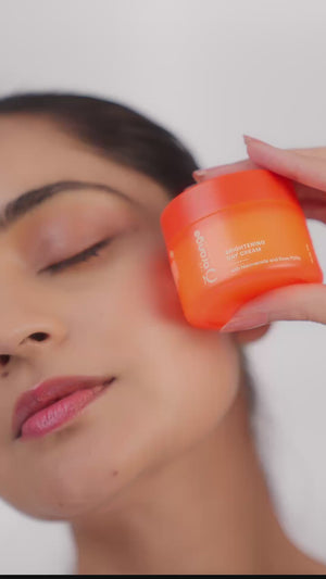 Orange Skincare Brightening Day Cream displayed in an elegant product showcase